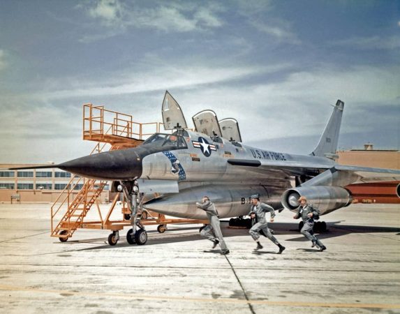 Strategic Air Command crew scrambles for takeoff in a B-58 supersonic bomber, c. 1960