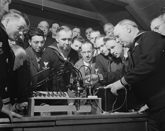 Coast Guard Auxiliary members in 1943 receiving instruction on marine engines