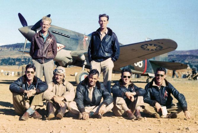 Pilots of the American Volunteer Group (AVG) Flying Tigers in China with a Chinese P-40 fighter, 1941