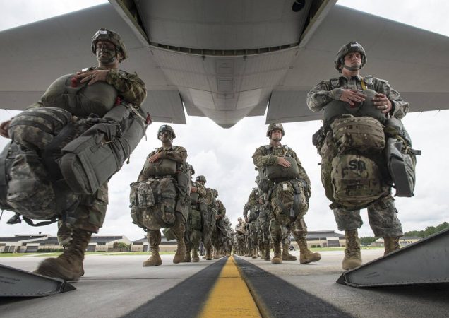 Boarding a C-130 Hercules aircraft during joint training with Army's 82nd Airborne Division, 2016